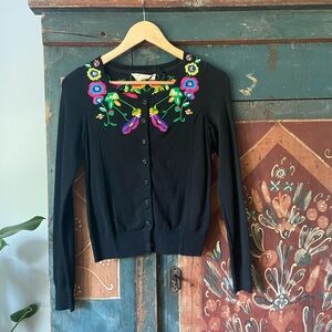 Anthropologie embroidered cardigan with sparkle buttons.
